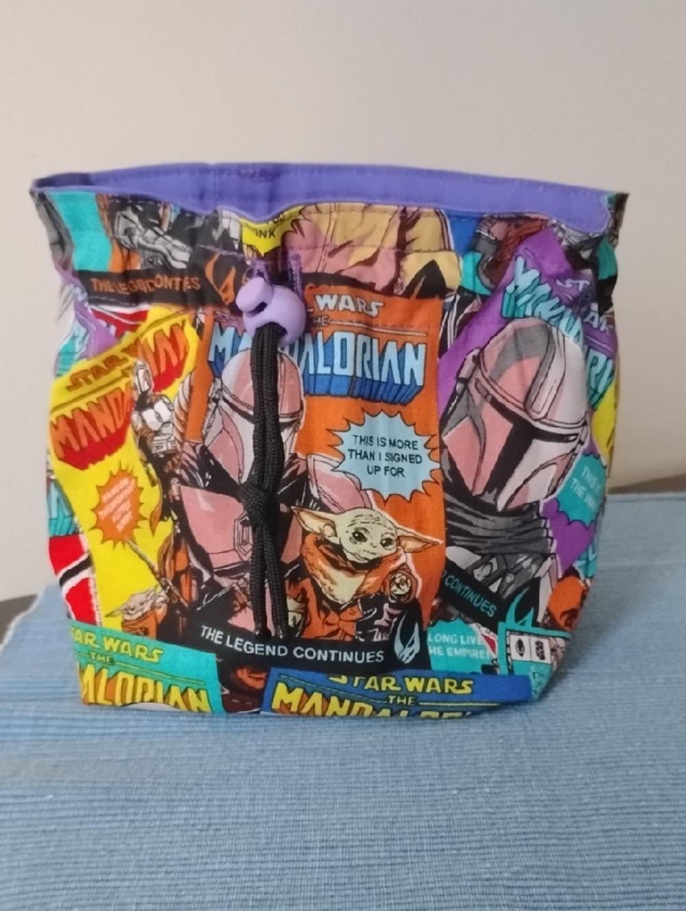The Mandalorian Comic-Print Mini Drawstring Bag - Purple Accent
